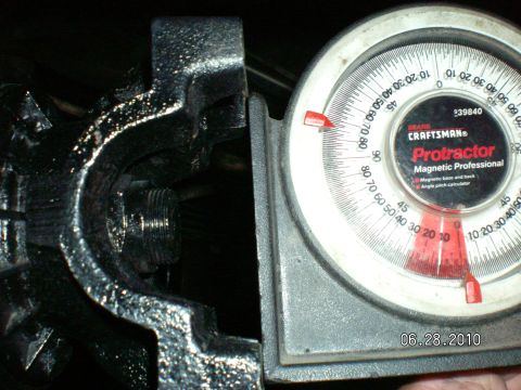 1996 Ford Bronco - Using a Craftsman magnetic protractor to measure the angle of a driveshaft component. The date is 06.28.2010.
