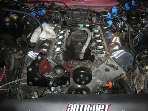 1992 Ford Crown Victoria - Engine bay during a rebuild, a supercharger and various engine components. ANTR.net branding is present.