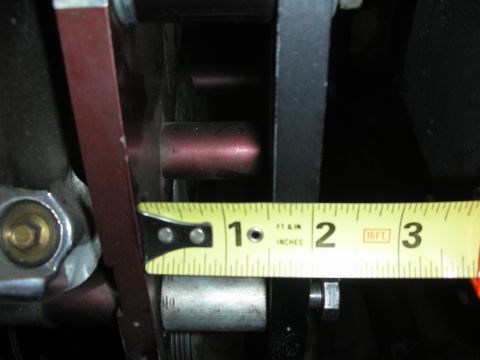 1992 Ford Crown Victoria - Close-up of an engine component with a measuring tape indicating a dimension of about 1.5 inches.