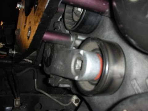 1992 Ford Crown Victoria - Engine belt tensioner assembly detail, likely from a Ford vehicle.