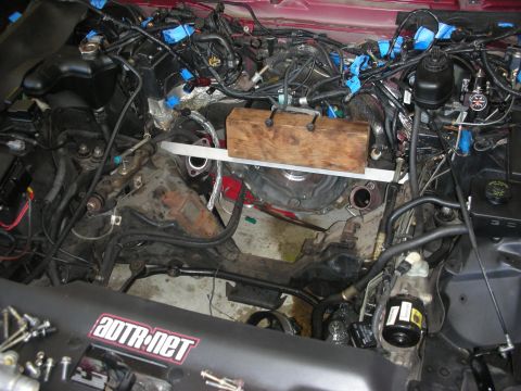 1992 Ford Crown Victoria - Engine bay during a rebuild, with the transmission removed and engine components exposed.