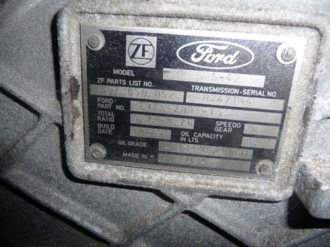 1990 Ford Bronco - A close-up of a Ford ZF transmission data plate shows various identification numbers and specifications.