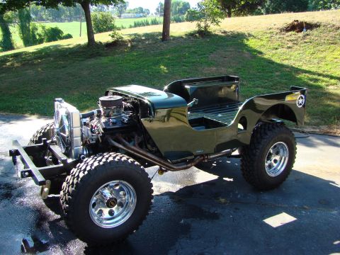 1948 Jeep Wrangler - This modified Jeep CJ-5 features an exposed engine and custom wheels.