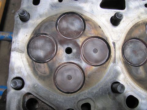 2005 Dodge 3500 - Close-up view of an engine cylinder head, showing the valves and surrounding metal.