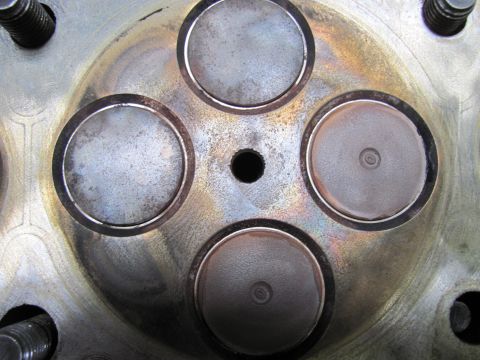 2005 Dodge 3500 - This is a close-up view of an engine's cylinder head, four valves and a central opening.
