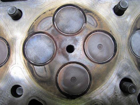 2005 Dodge 3500 - Close-up view of an engine cylinder head, showing the valve seats and surrounding metal.