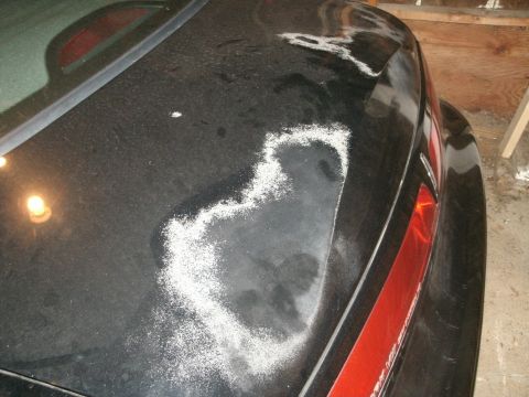 1998 Lincoln Mark VIII - The paint on this car's trunk is severely damaged, with white residue visible.