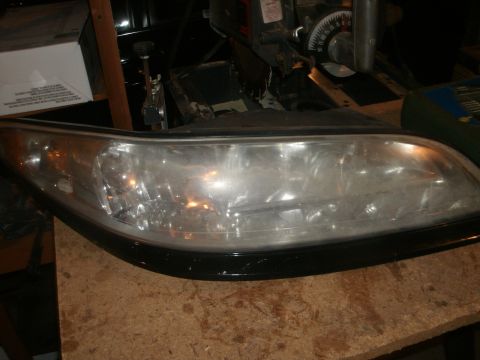 1998 Lincoln Mark VIII - A single headlight assembly is shown, likely a replacement part.
