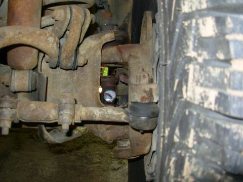 1983 Ford Bronco - Somehow, I managed to break this Spicer u-joint in soft dirt. ...and bend the tie rods, and collapse the R spring, and pull the frame rail…