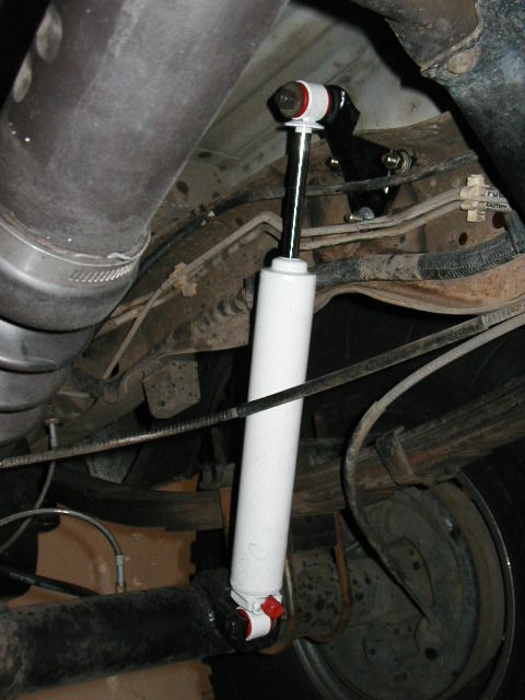 1995 Ford Bronco - Upper rear shock mount. took stock mount, cut rivets and bolted it up higher, after a little cutting. This eventually broke. next several p…