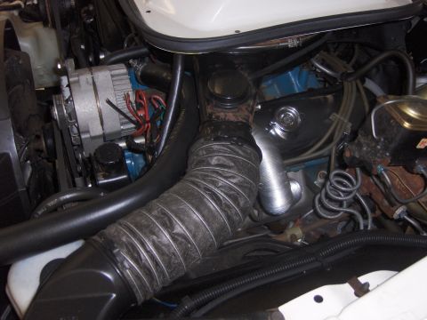 1979 Chevrolet Camaro - Close-up view of an engine bay, showing various components and wiring.