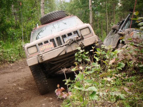 1998 Jeep Cherokee - A 1998 Jeep Cherokee navigates a challenging, muddy off-road course.