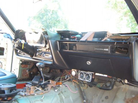 1973 Ford Ranchero - Interior view of a 1973 Ford Ranchero dashboard, showing the glove box and steering column.