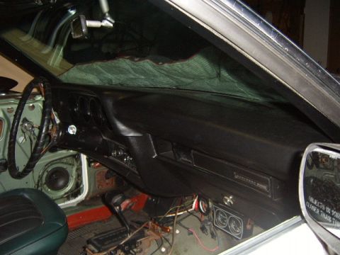 1973 Ford Ranchero - The interior of a 1973 Ford Ranchero is shown, with the dashboard and steering wheel visible.