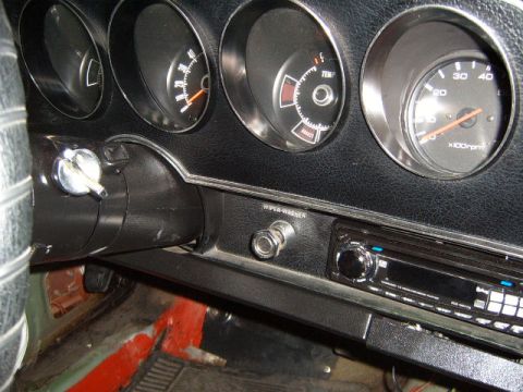 1973 Ford Ranchero - Dashboard view of a 1973 Ford Ranchero, showing gauges, ignition, and radio.