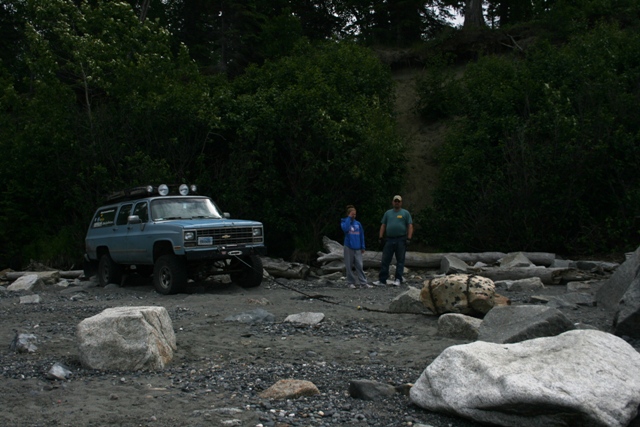 Blue 1990 Chevrolet Suburban with roof lights and winch