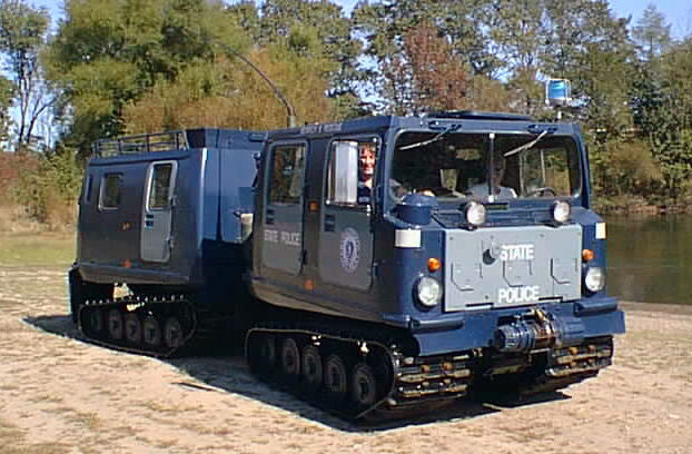 Blue tracked vehicle with "STATE POLICE" markings