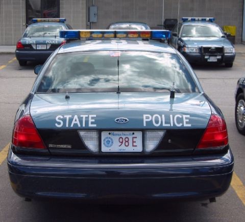 1998 Ford Crown Victoria - This 1998 Ford Crown Victoria police car is parked in a lot with other state police vehicles.