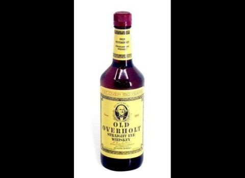 1997 Ford Taurus - A bottle of Old Overholt Straight Rye Whiskey is shown against a black and white background.