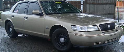 2000 Mercury Grand Marquis - This 2000 Mercury Grand Marquis is seen from a three-quarter front angle.