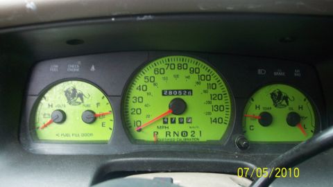 2004 Ford Crown Victoria - The dashboard gauges display various readings, including speed, fuel level, and engine temperature.