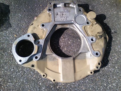 1990 Ford Bronco - This is a transmission bell housing, not a 1990 Ford Bronco. It has casting marks and a revision number.