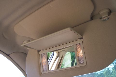 2001 Ford Crown Victoria - The illuminated vanity mirror is part of a car's sun visor.