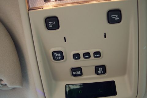 2001 Ford Crown Victoria - Interior view of a car's overhead console, showing various control buttons.
