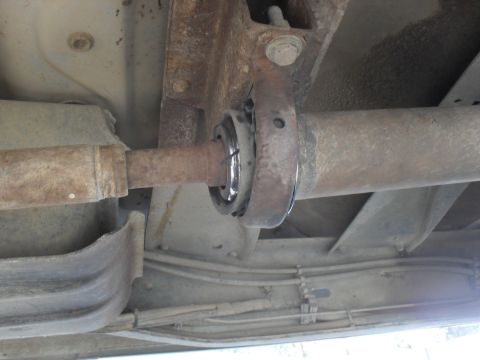 1991 Ford F-350 - Underside view of the carrier bearing on the driveshaft of a 1991 Ford F-350.