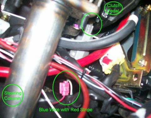 1995 Ford Probe - This image shows a detailed view of the wiring and pedals inside a vehicle's cabin.