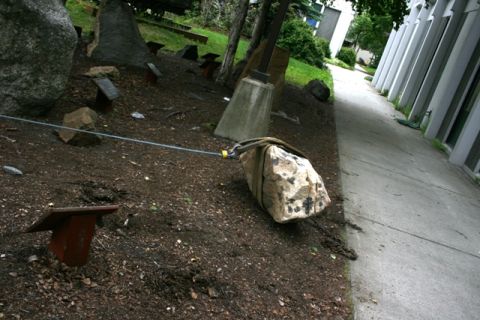 1990 Chevrolet Suburban - A scene depicting a rock garden with various stones, some of which are connected by cables.