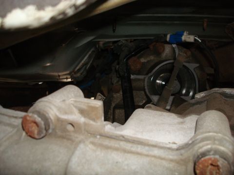 1996 Ford Bronco - Underside view of vehicle drivetrain components, including transmission and driveshaft parts.