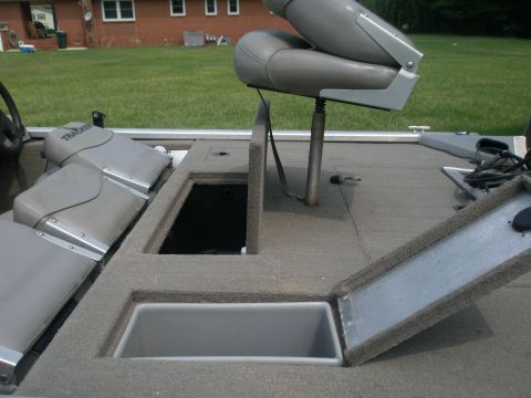 1998 Chevrolet Silverado 1500 - Interior view of a boat with multiple seats and storage compartments.