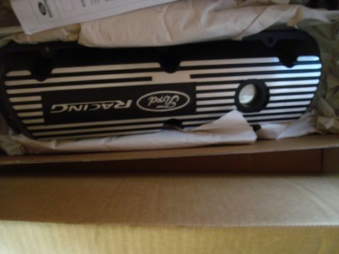 1993 Ford Bronco - A black Ford Racing valve cover with silver stripes is shown, likely for an engine rebuild.