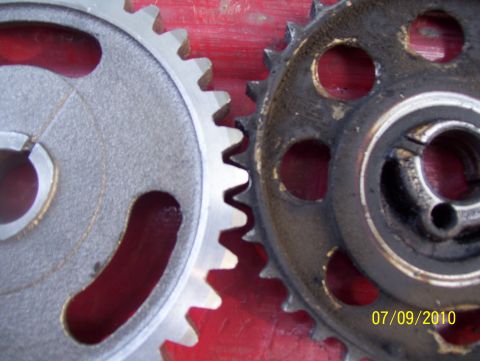 1978 Ford Bronco - Close-up of two meshing engine timing gears, one clean and one dirty, with a date stamp in the lower right corner.