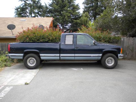 1989 Ford Bronco - This pickup truck appears to be from the mid-1990s, not a 1989 Ford Bronco.