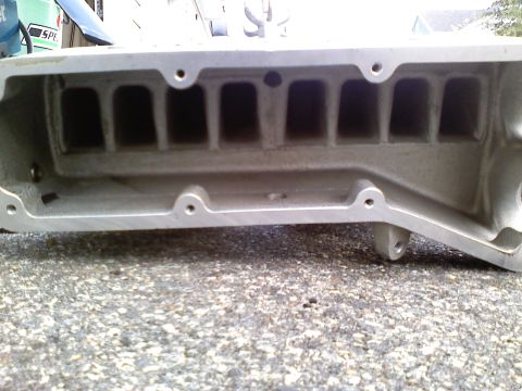 1990 Ford Bronco - Close-up of an aluminum intake manifold, showing its internal runner structure.