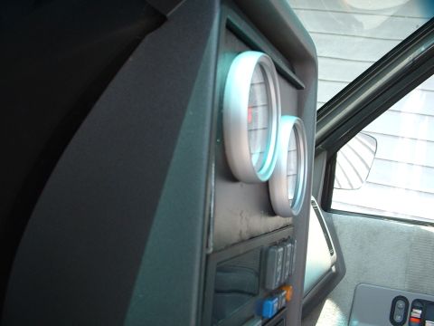 1994 GMC Suburban - Interior view of a 1994 GMC Suburban dashboard, aftermarket gauges.