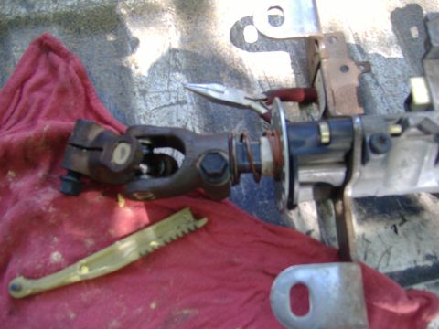 1995 Ford F-150 - Close-up of a steering column universal joint and shaft assembly, possibly for a Ford F-150.