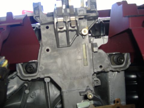 1995 Ford F-150 - This is a close-up view of a vehicle's steering column assembly, showing various mechanical parts.