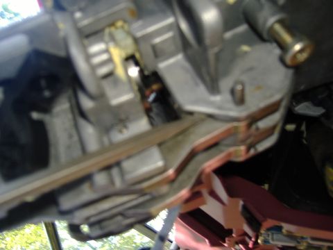 1995 Ford F-150 - Close-up view of a vehicle's steering column assembly, showing internal mechanical components.