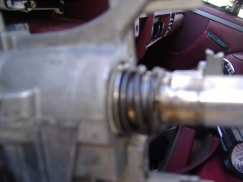 1995 Ford F-150 - Steering column component detail, with maroon interior visible behind.