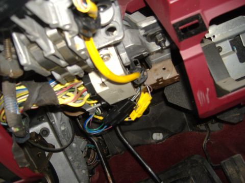 1995 Ford F-150 - Close-up of the steering column wiring harness in a 1995 Ford F-150.