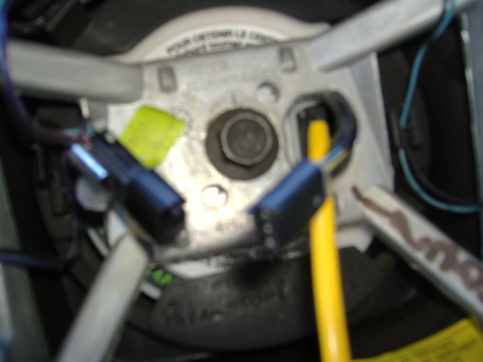 Steering column wiring harness with yellow and blue wires