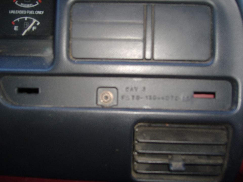 Dashboard interior with fuel gauge and part number FOTO-150-4DT0-15