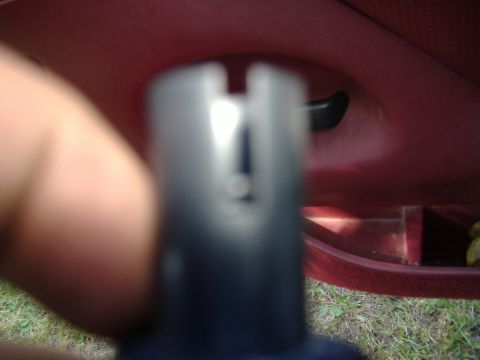 1995 Ford F-150 - A close-up view of a steering column component, possibly a shroud or lever housing.