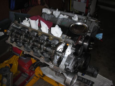 1992 Ford Crown Victoria - Close-up view of an engine block during a rebuild, showing camshafts and timing components.
