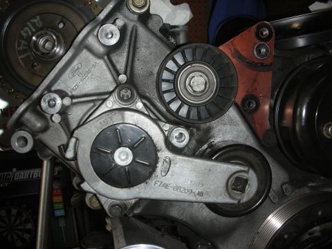 1992 Ford Crown Victoria - Ford engine accessory bracket assembly showing pulleys and part numbers.