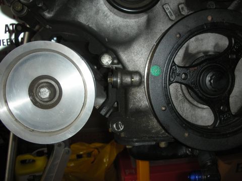 1992 Ford Crown Victoria - Detail of engine pulleys and associated hardware, likely during a rebuild or maintenance.