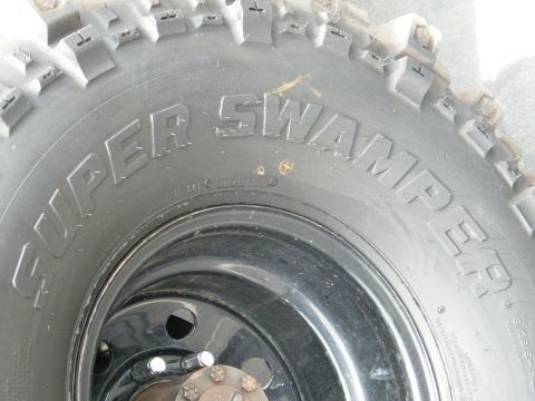1982 Ford Bronco - This image shows a close-up of a Super Swamper tire, not the entire vehicle.